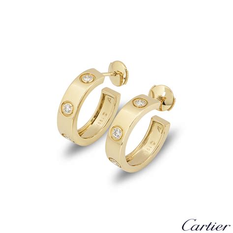 cartier earrings with diamonds.